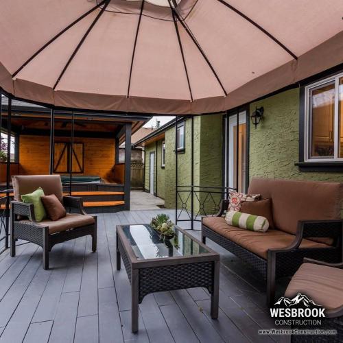  | Extend your home by creating a backyard, patio or deck that incorporates your hot tub into the design. Make an impact, check out our before and after with this patio and hot tub. | Custom Decks / Patios Construction and Outdoor Living Space Renovations 